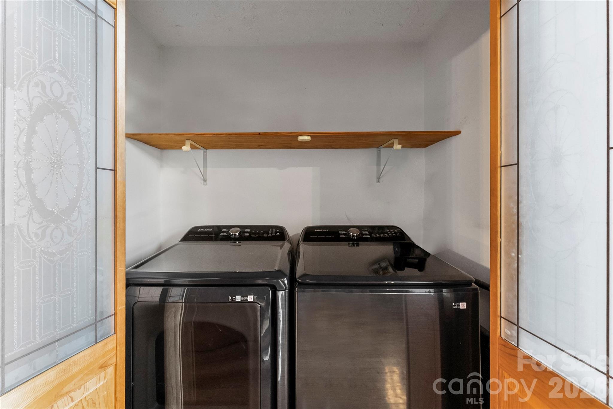 5011 Medlin Road Monroe, NC 28112 - Photo 15 of 37 a utility room with dryer and washer