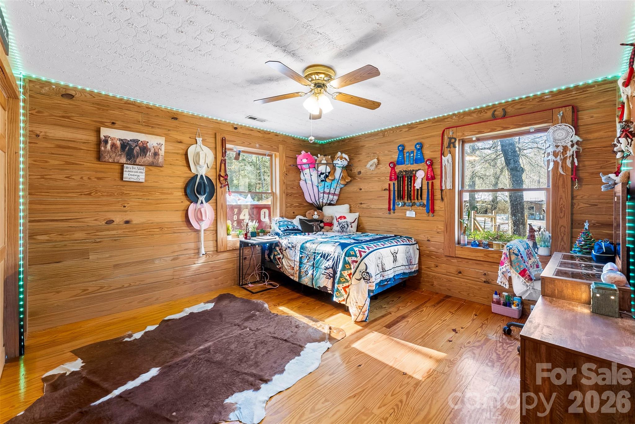 5011 Medlin Road Monroe, NC 28112 - Photo 16 of 37 a bedroom with a bed and a window