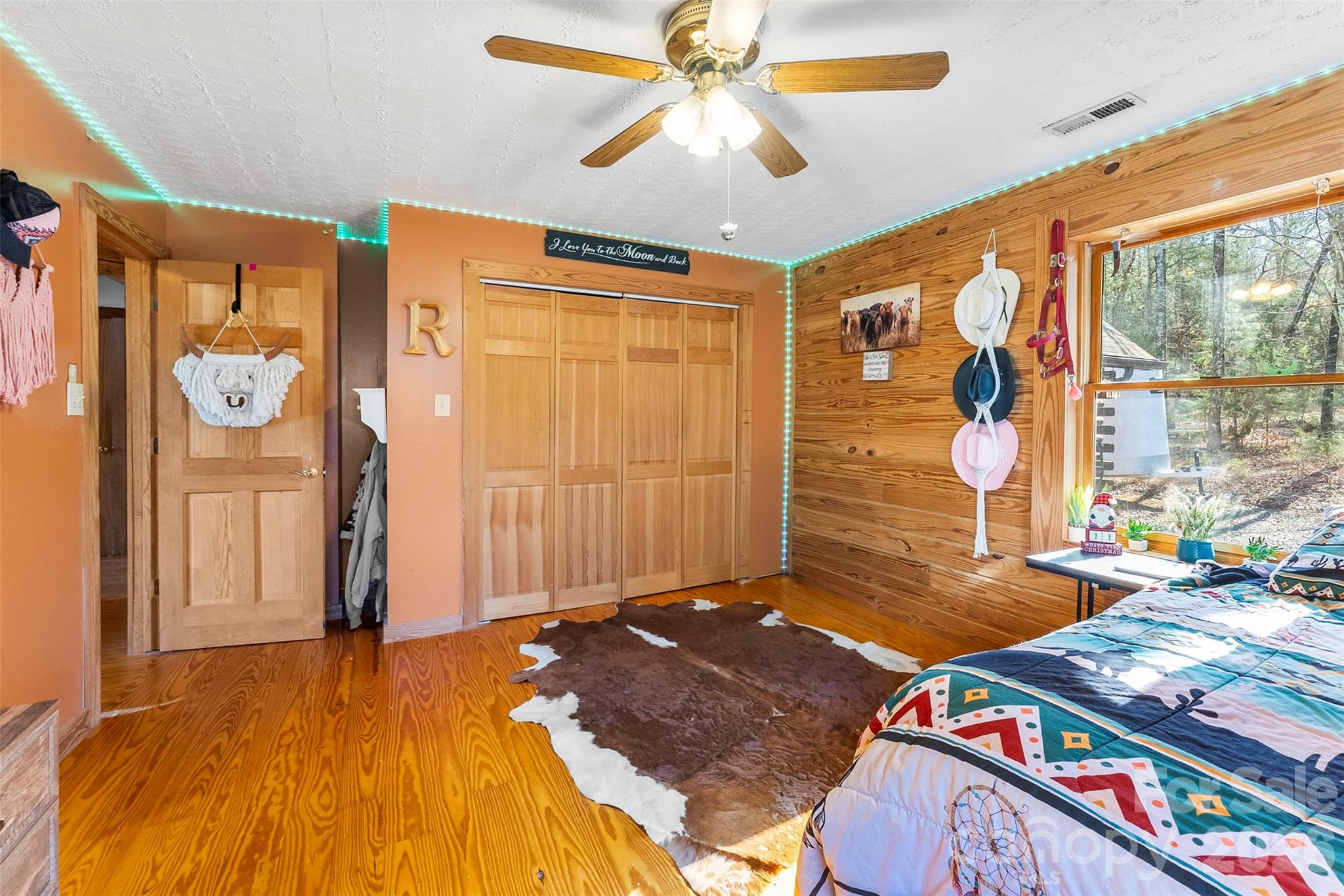 5011 Medlin Road Monroe, NC 28112 - Photo 17 of 37 a bedroom with a bed and a window