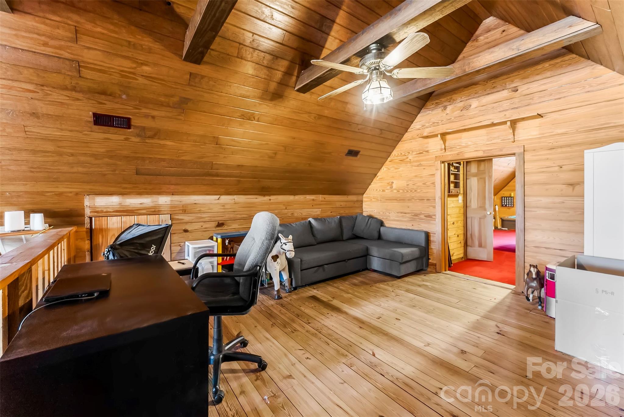 5011 Medlin Road Monroe, NC 28112 - Photo 21 of 37 a living room with furniture and a flat screen tv