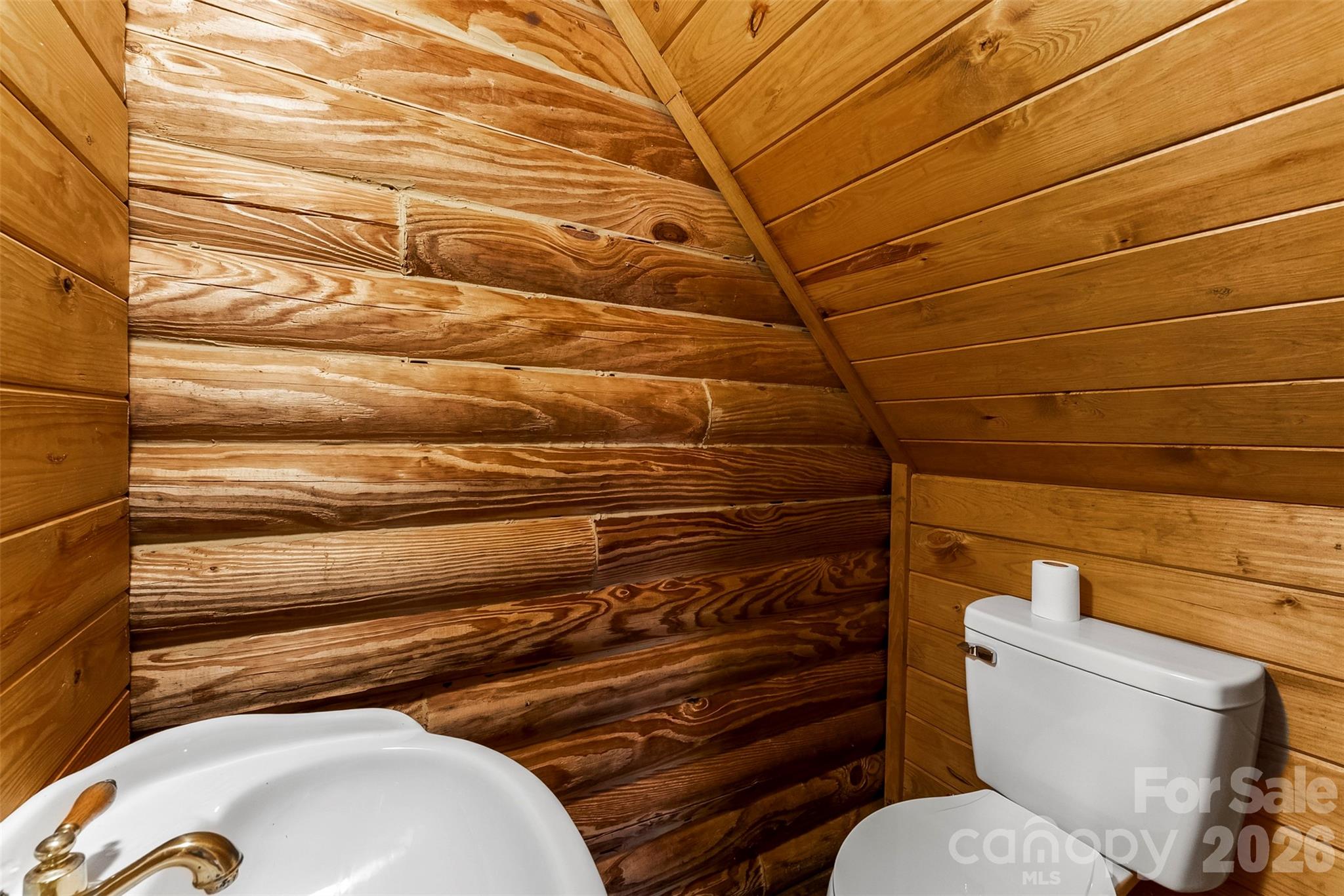 5011 Medlin Road Monroe, NC 28112 - Photo 23 of 37 a bathroom with a toilet and a sink