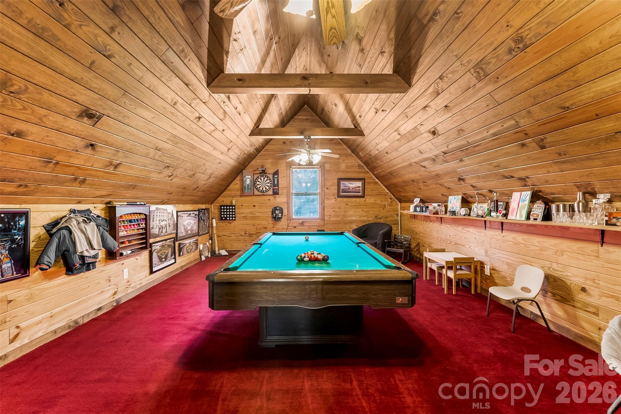 5011 Medlin Road Monroe, NC 28112 - Photo 24 of 37 a living room with a table tennis pool and furniture