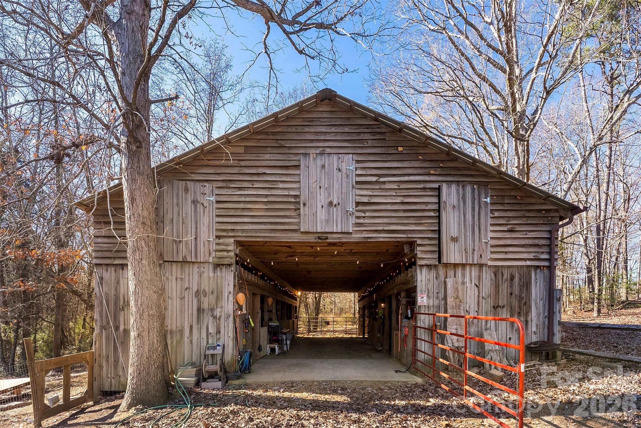 5011 Medlin Road Monroe, NC 28112 - Photo 29 of 37 a front view of a house with a glass door