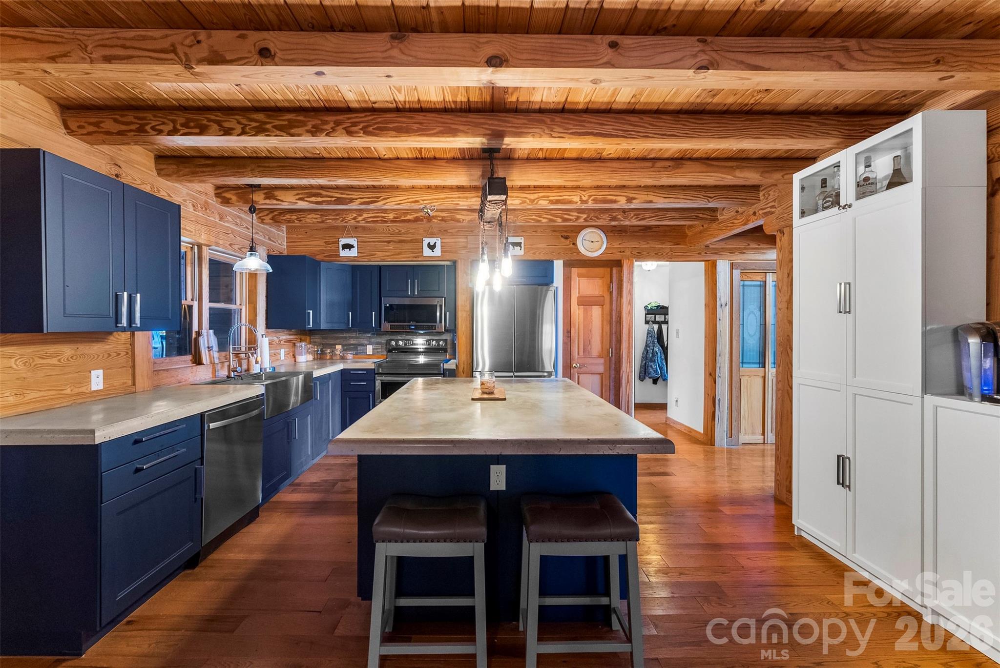 5011 Medlin Road Monroe, NC 28112 - Photo 5 of 37 a kitchen with stainless steel appliances granite countertop a sink stove and refrigerator