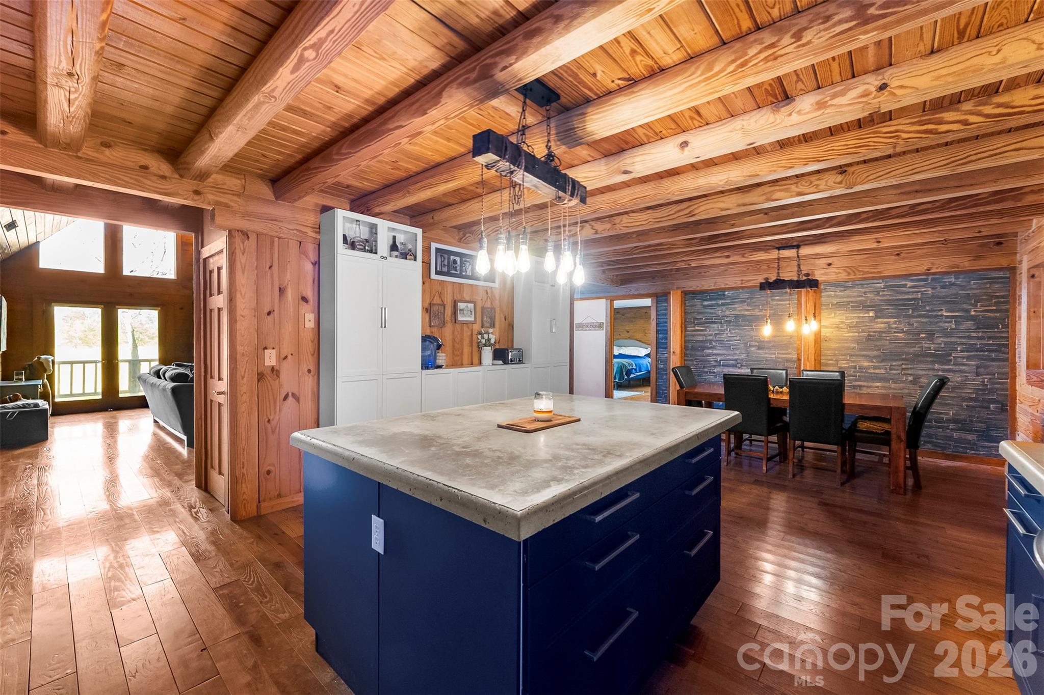 5011 Medlin Road Monroe, NC 28112 - Photo 6 of 37 a view of kitchen island with granite countertop lots of counter top space