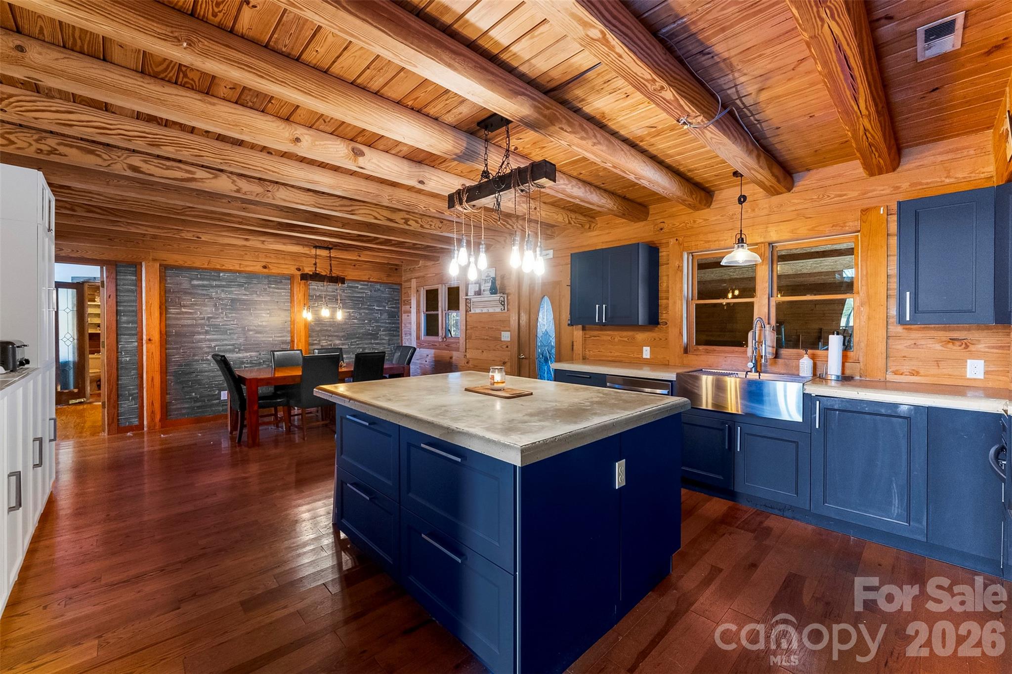 5011 Medlin Road Monroe, NC 28112 - Photo 7 of 37 a kitchen with a stove and cabinets