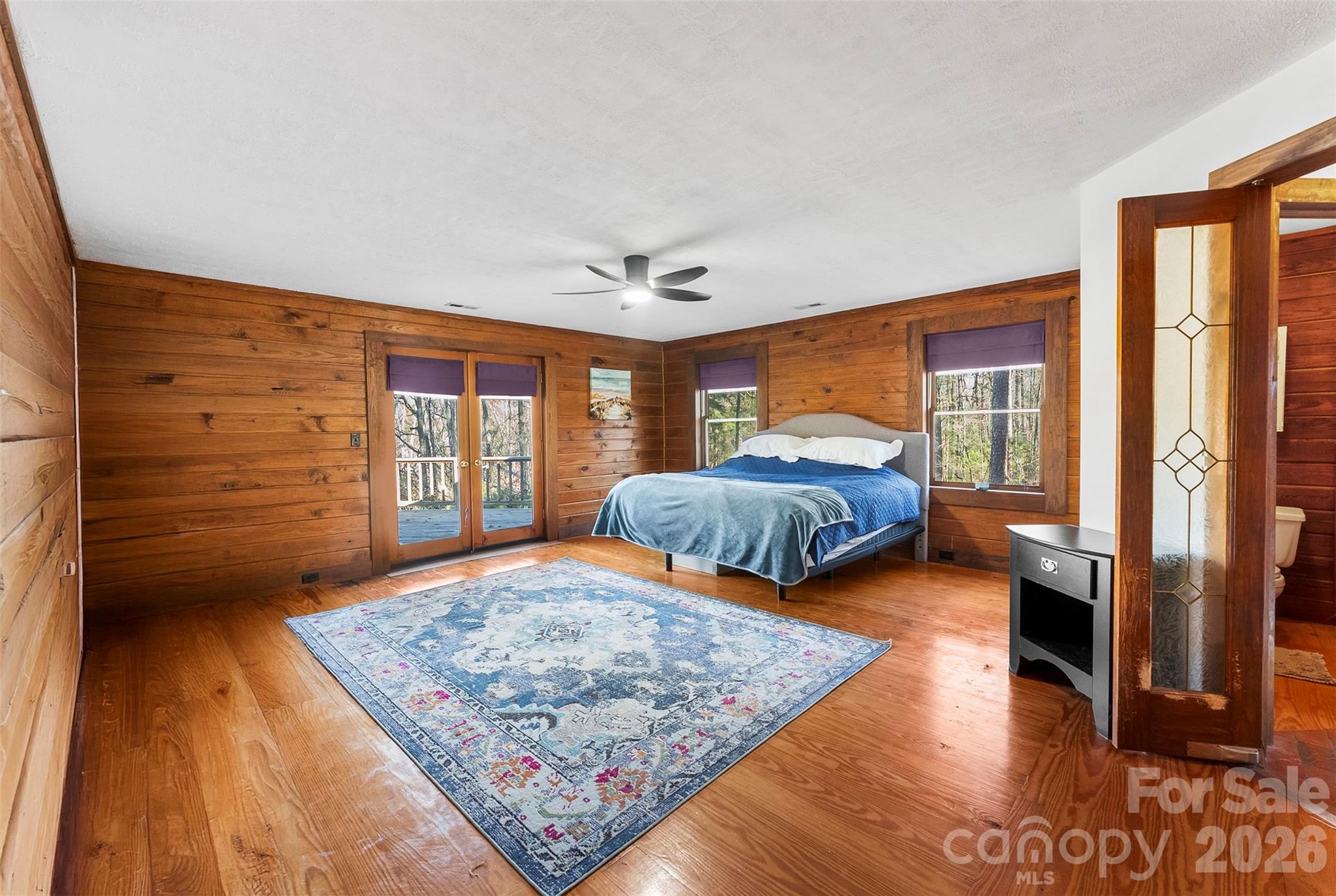 5011 Medlin Road Monroe, NC 28112 - Photo 10 of 37 a bedroom with a bed and a dresser next to a window