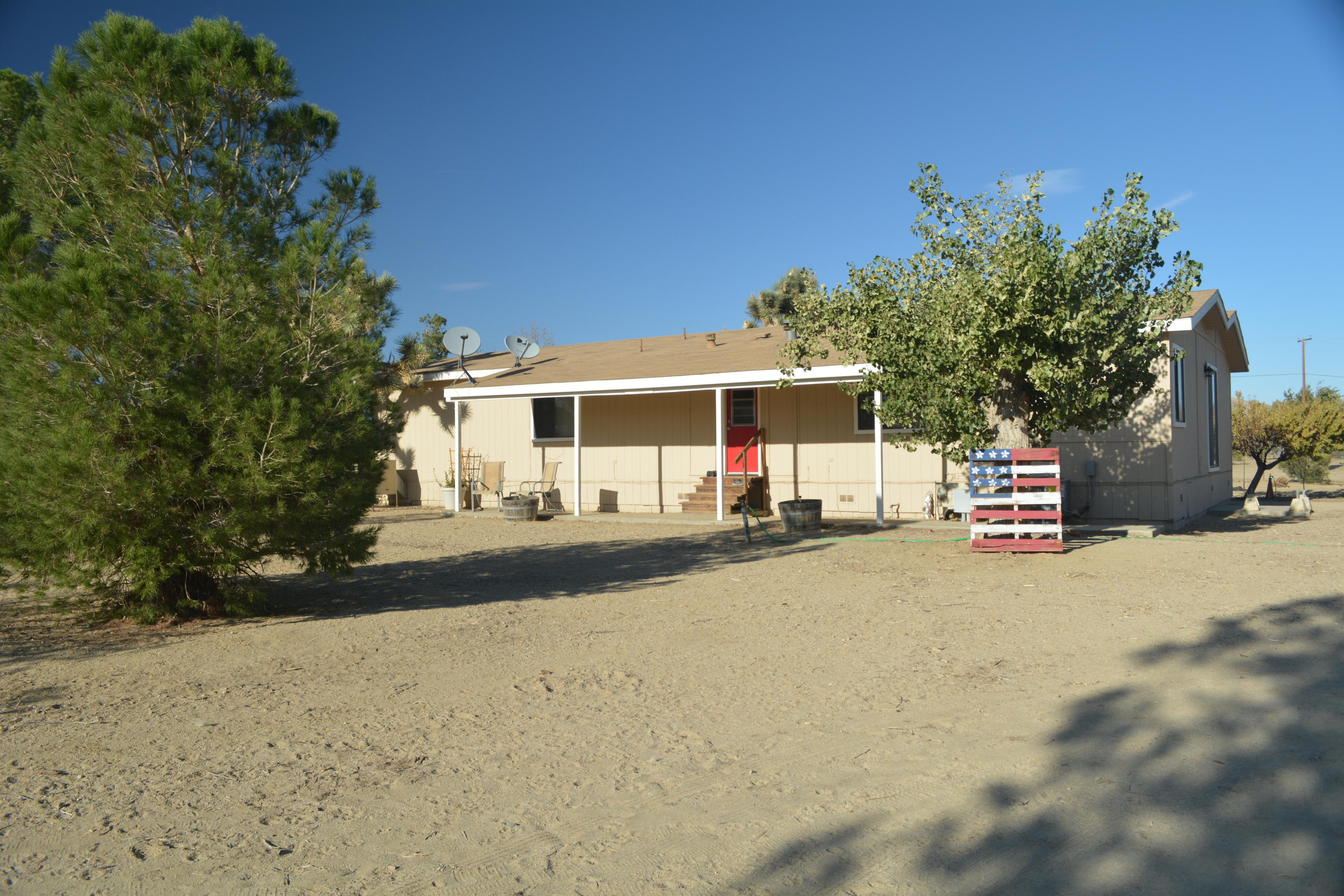 4780 Montiverde Road Mojave, CA 93501 - Photo 27 of 52 a view of a house with a outdoor space and street view