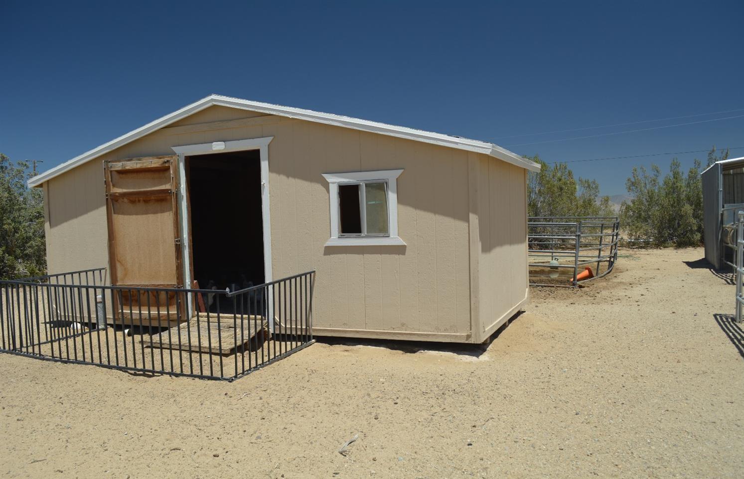 4780 Montiverde Road Mojave, CA 93501 - Photo 28 of 52 a view of a house with a roof deck