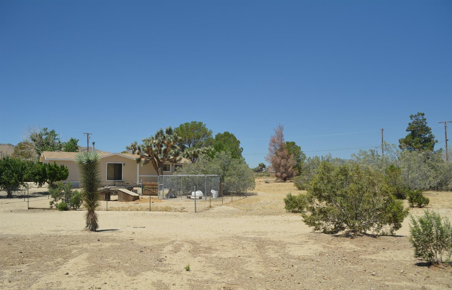 4780 Montiverde Road Mojave, CA 93501 - Photo 35 of 52 a view of a road with a building in the background