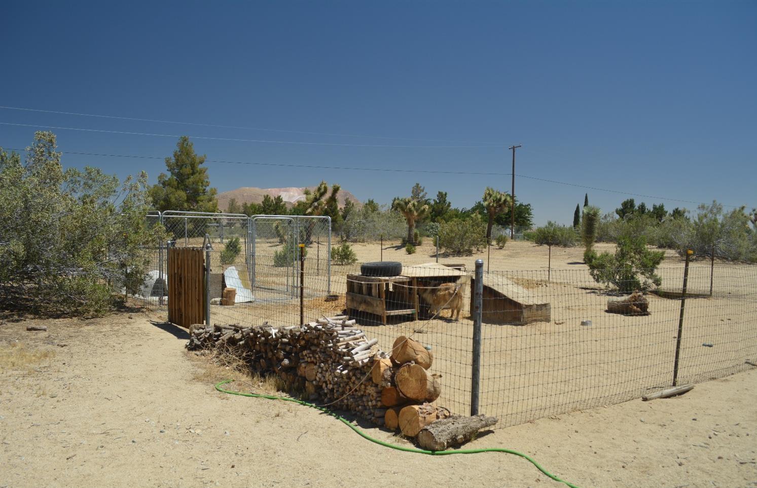4780 Montiverde Road Mojave, CA 93501 - Photo 37 of 52 a view of a terrace with a bench