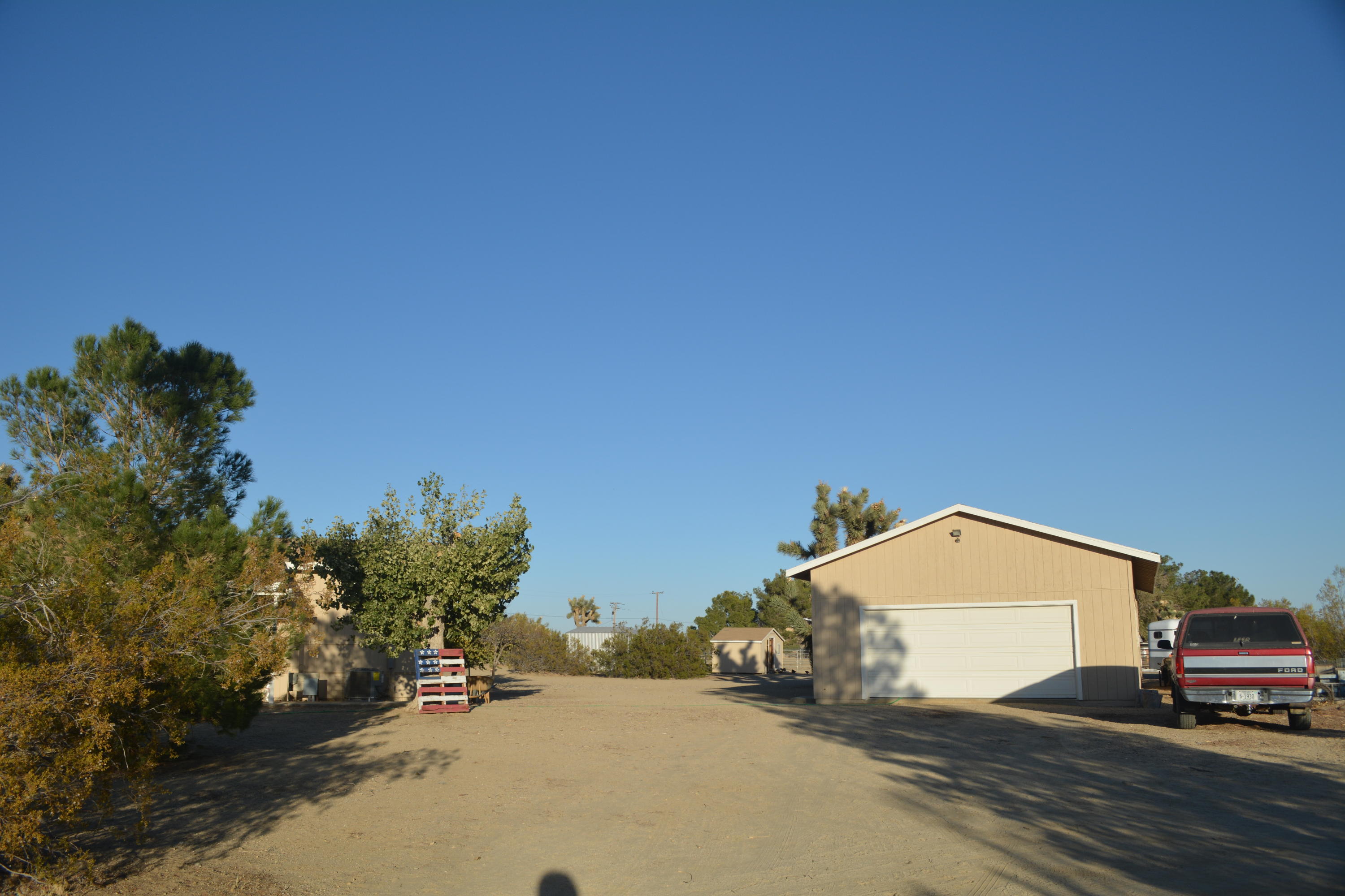 4780 Montiverde Road Mojave, CA 93501 - Photo 46 of 52 a view of a house with a yard