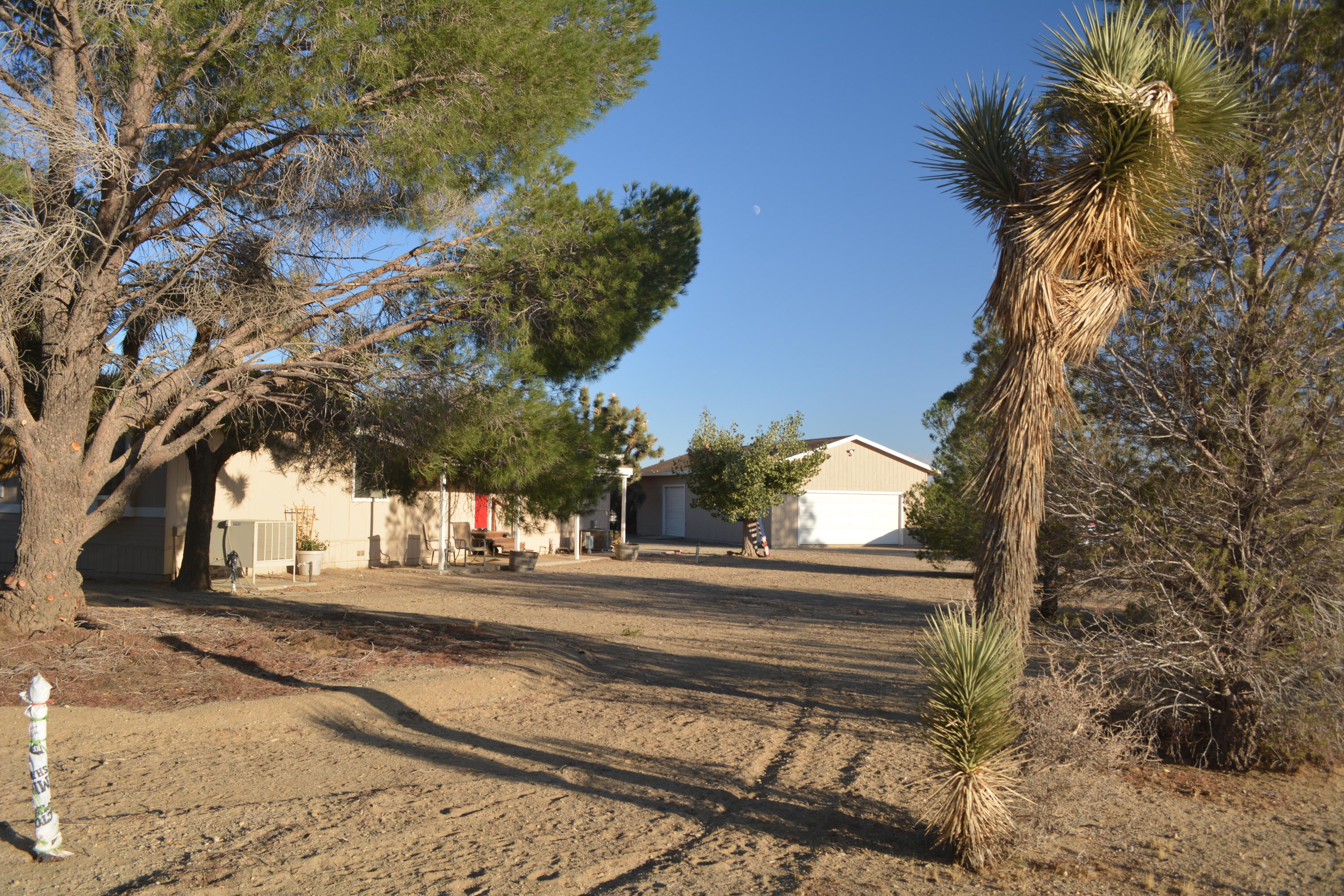 4780 Montiverde Road Mojave, CA 93501 - Photo 47 of 52 a view of a house with a yard