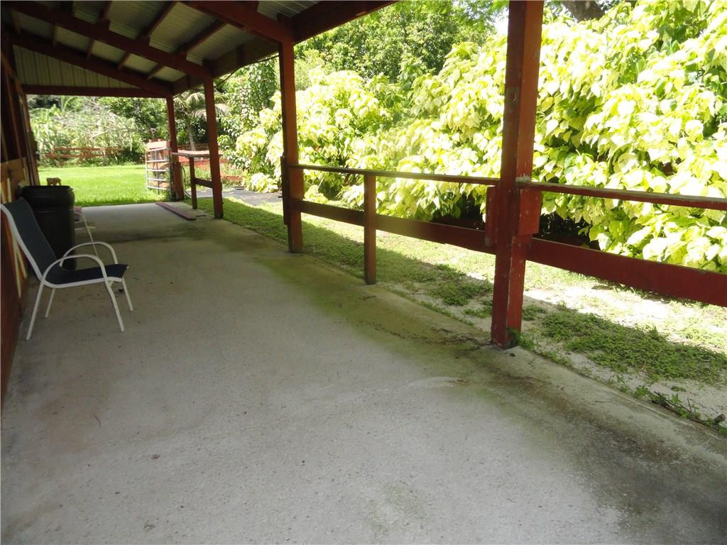 17950 Southwest 55th Street Southwest Ranches, FL 33331 - Photo 22 of 31 a view of a yard with porch