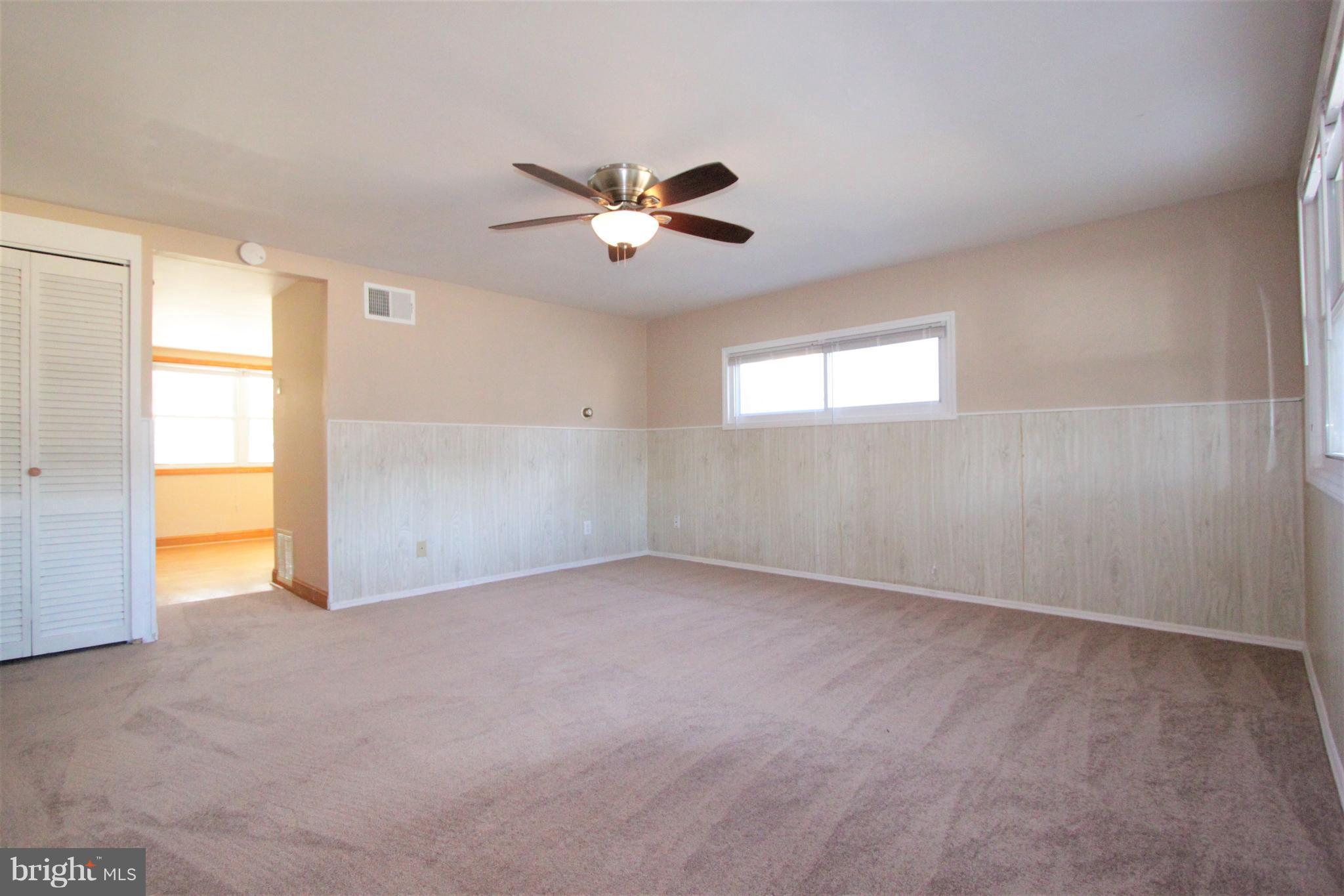 3111 Bero Road Baltimore, MD 21227 - Photo 11 of 25 a view of an empty room with a window