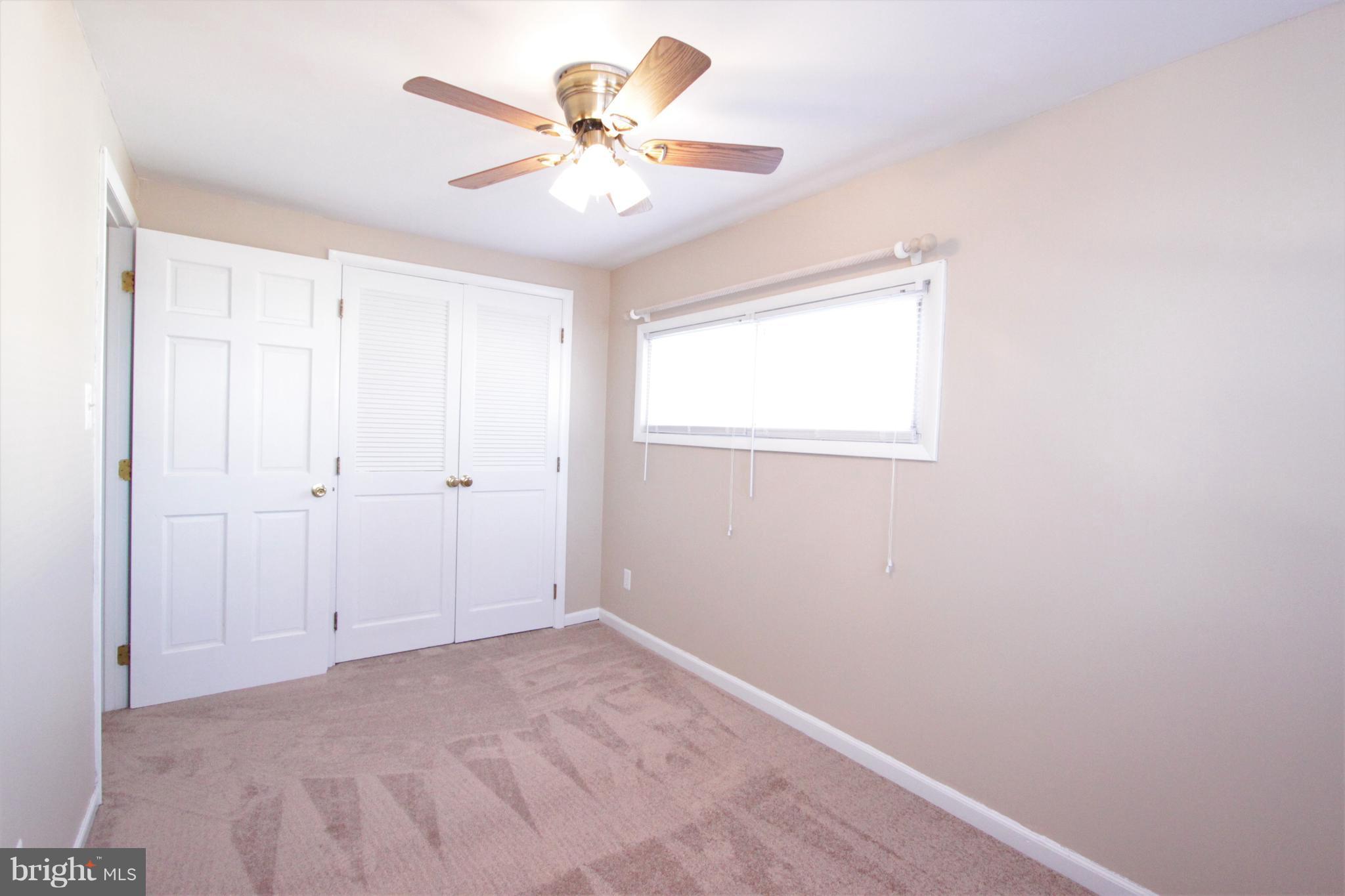 3111 Bero Road Baltimore, MD 21227 - Photo 16 of 25 an empty room with a window