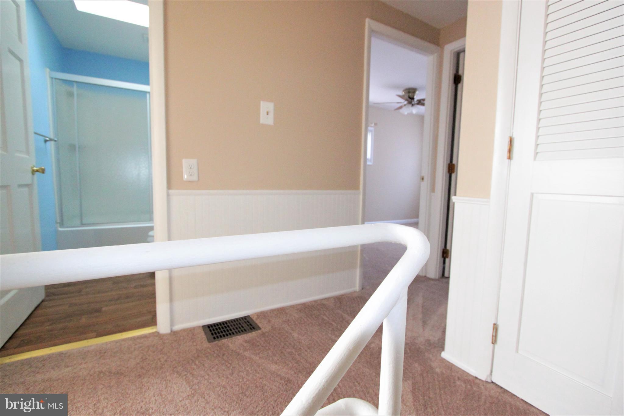 3111 Bero Road Baltimore, MD 21227 - Photo 9 of 25 a bathroom with a tub shower and sink