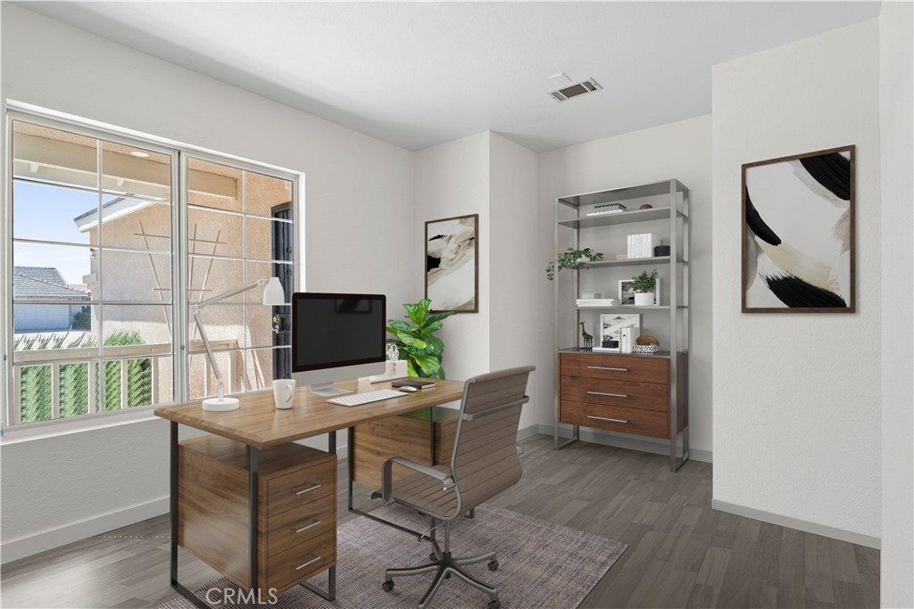 11688 Cornell Street Adelanto, CA 92301 - Photo 19 of 40 a workspace with furniture and window