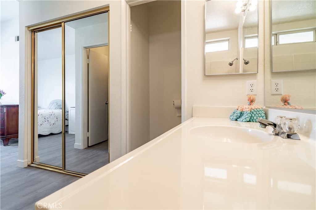 11688 Cornell Street Adelanto, CA 92301 - Photo 27 of 40 a bathroom with a tub sink and shower
