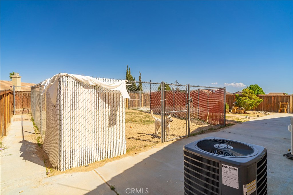 11688 Cornell Street Adelanto, CA 92301 - Photo 33 of 40 a view of a swimming pool and a patio