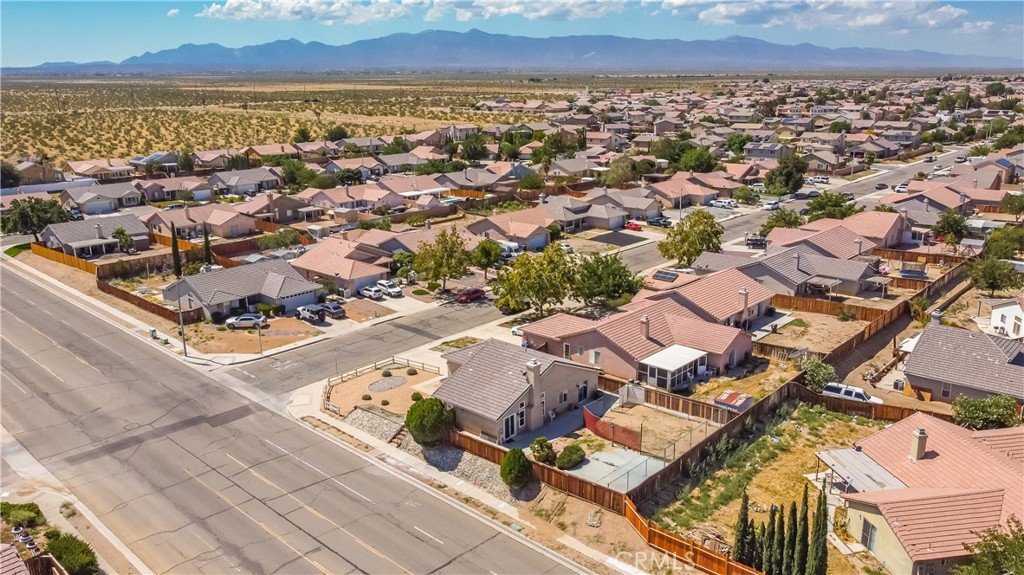 11688 Cornell Street Adelanto, CA 92301 - Photo 37 of 40 an aerial view of residential houses with outdoor space