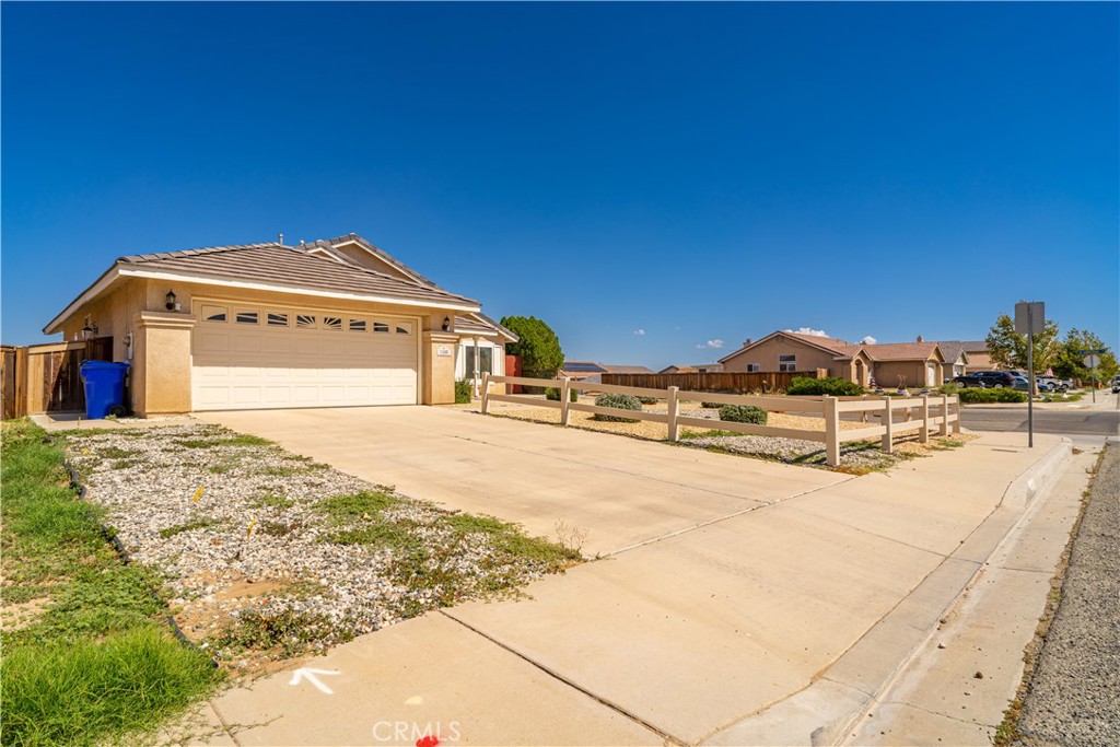 11688 Cornell Street Adelanto, CA 92301 - Photo 5 of 40 a view of the house with a outdoor space