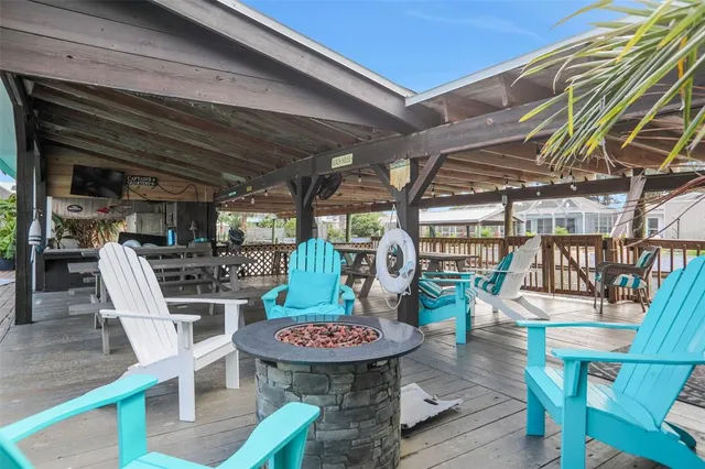 a kitchen with a sink a stove and refrigerator