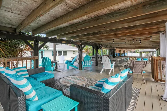 a view of a chairs and table in a patio
