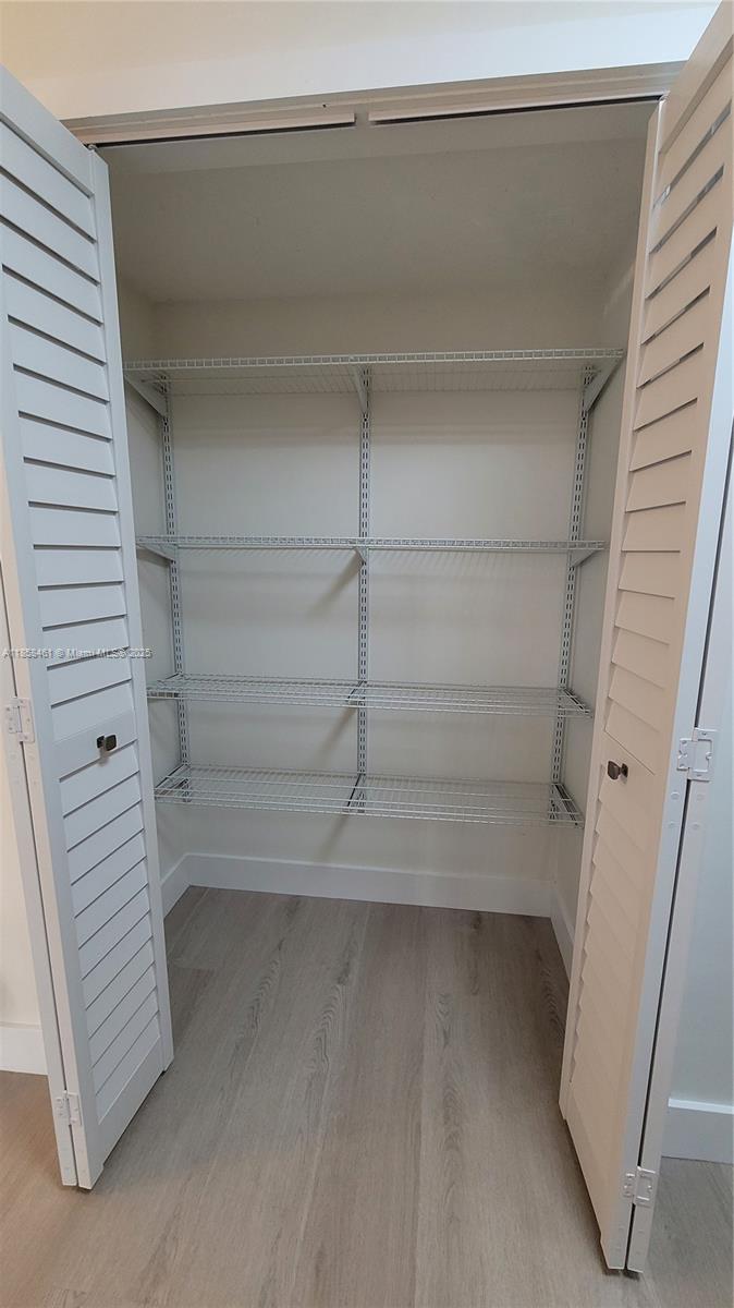 22731 Southwest 88th Place, Unit 101 Cutler Bay, FL 33190 - Photo 12 of 59 a view of walk in closet