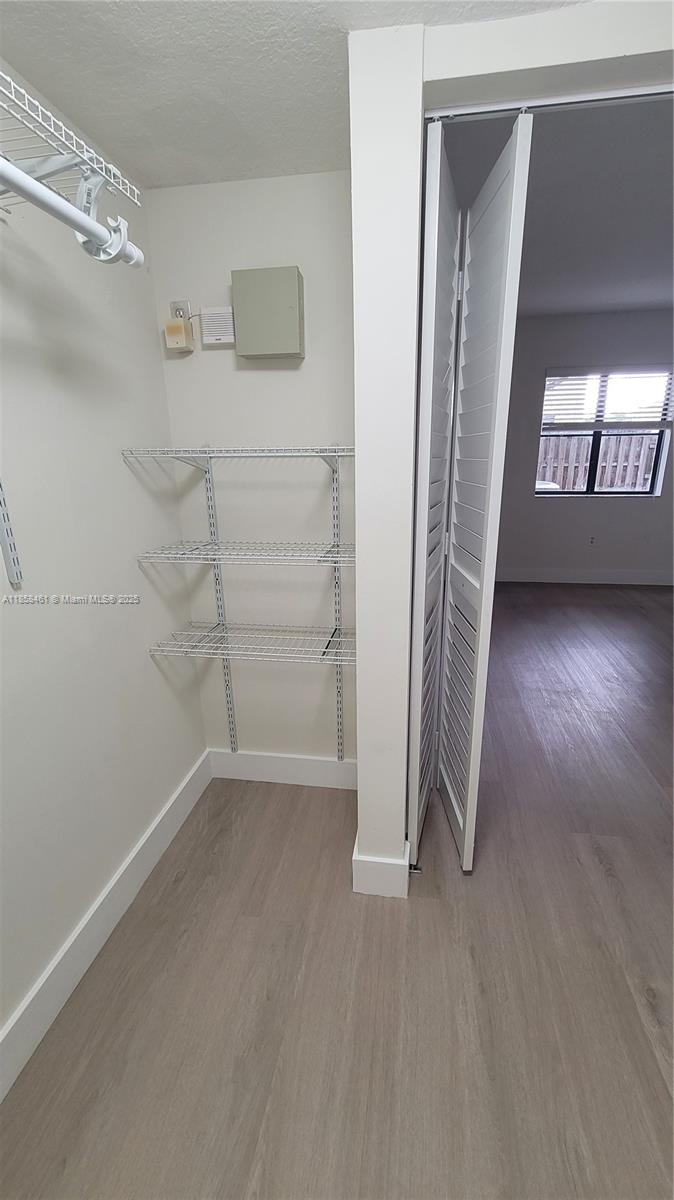 22731 Southwest 88th Place, Unit 101 Cutler Bay, FL 33190 - Photo 25 of 59 a view of an empty room