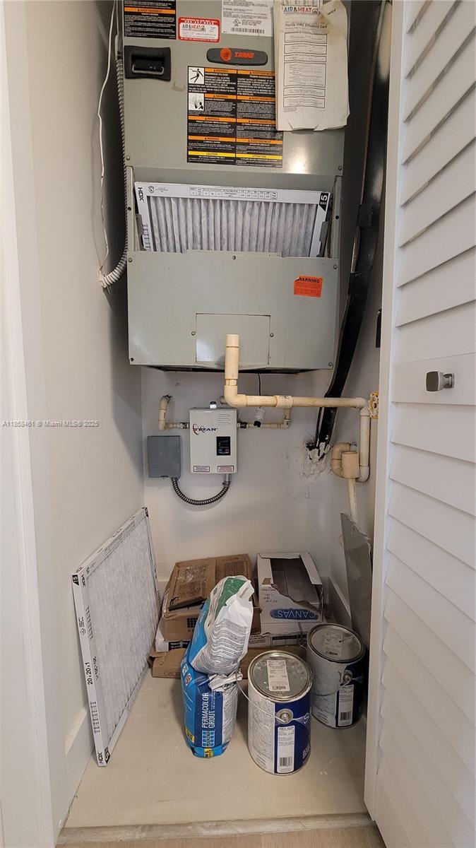 22731 Southwest 88th Place, Unit 101 Cutler Bay, FL 33190 - Photo 31 of 59 a utility room with dryer and washer