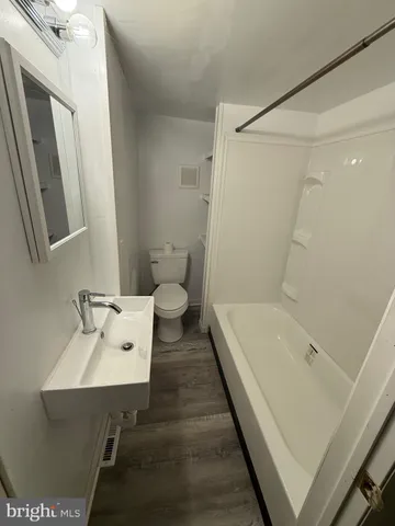 a view of a hallway with entryway