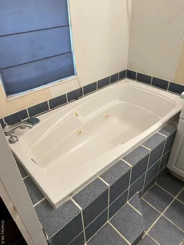 a living room with a couch and a table