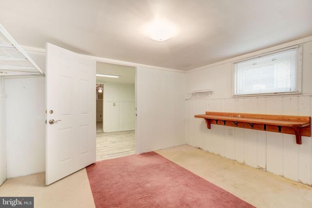 a view of a room with a bench