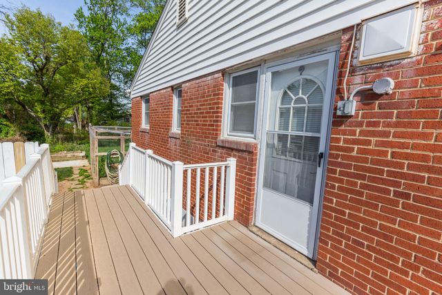 a view of outdoor space with deck and wooden floor
