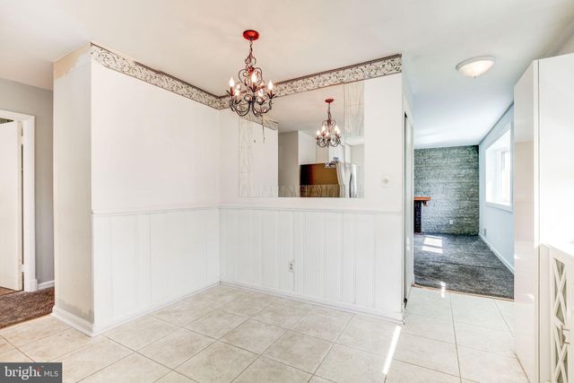 a view of a bathroom with a shower and a sink