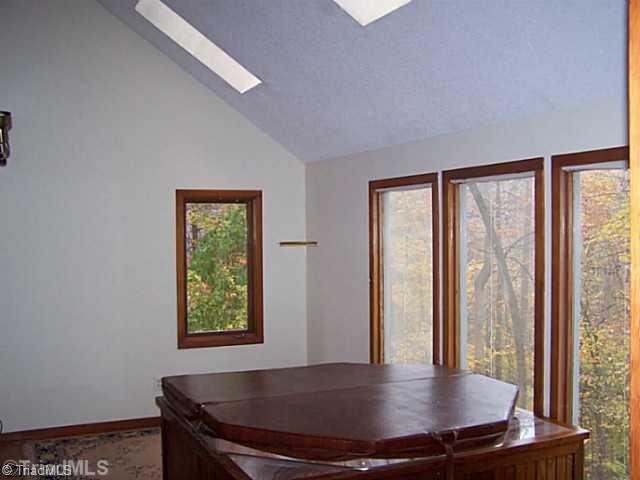 3081 High Cliffs Road Pfafftown, NC 27040 - Photo 13 of 16 Sunroom. with hot tub