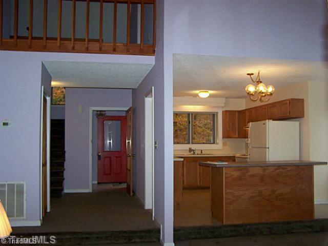 Living Room. into kitchen and upstairs
