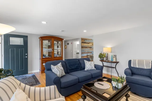a kitchen with a stove a sink and a refrigerator