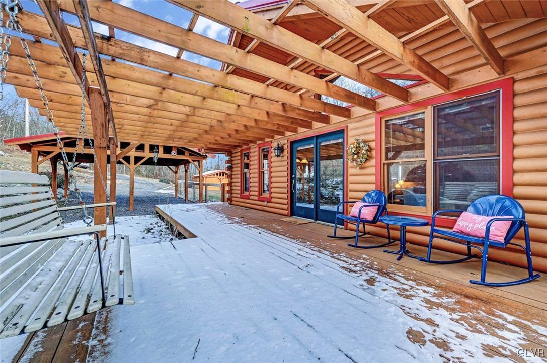 355 Tower Road Sugarloaf, PA 18249 - Photo 8 of 75 View of the expansive front deck with built-in per
