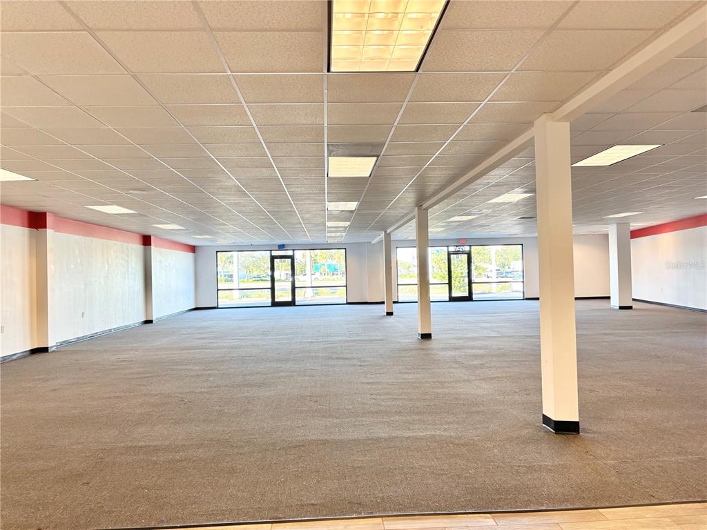 2672 Tamiami Trail, Unit 6B 7B Port Charlotte, FL 33952 - Photo 17 of 36 a view of empty room with windows