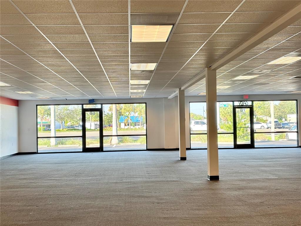 2672 Tamiami Trail, Unit 6B 7B Port Charlotte, FL 33952 - Photo 18 of 36 a view of an empty room with a window