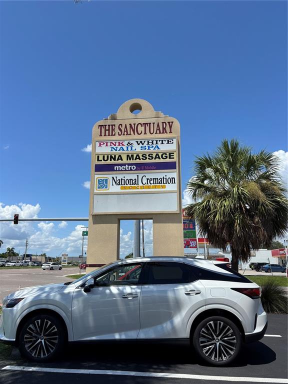2672 Tamiami Trail, Unit 6B 7B Port Charlotte, FL 33952 - Photo 28 of 36 a view of a car parked front of a house
