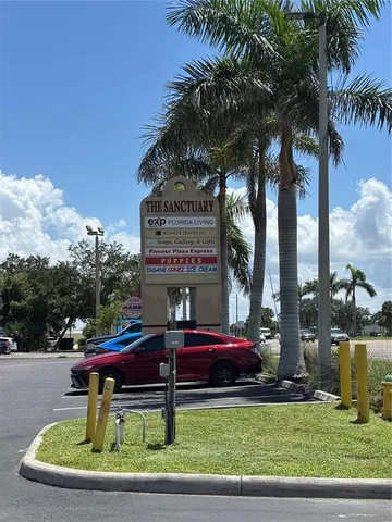 a view of a car park in front of house