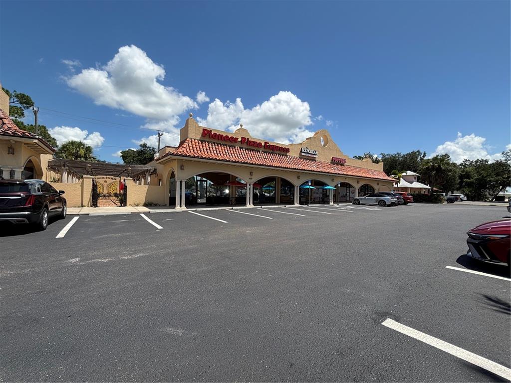 2672 Tamiami Trail, Unit 6B 7B Port Charlotte, FL 33952 - Photo 31 of 36 a view of a car park in front of house