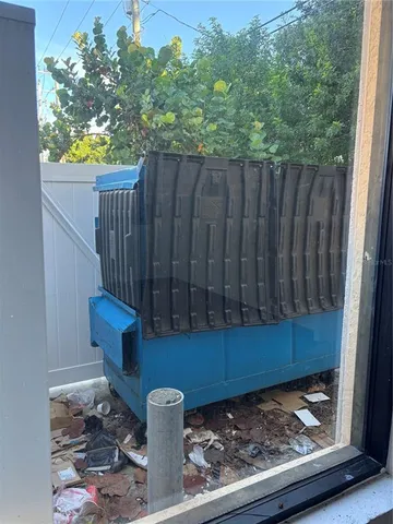 a view of street with parked cars