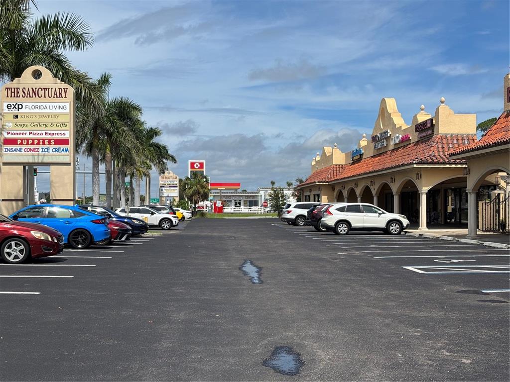 2672 Tamiami Trail, Unit 6B 7B Port Charlotte, FL 33952 - Photo 36 of 36 a view of street with parked cars
