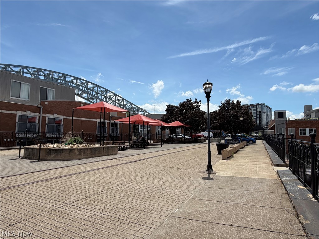 1237 Washington Avenue, Unit 612 Cleveland, OH 44113 - Photo 26 of 42 Umbrella tables on the connected Superior Viaduct