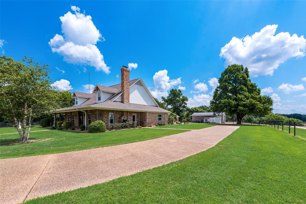 669 VZ County Road Canton, TX 75103 - Photo 8 of 40 a view of a house with a yard