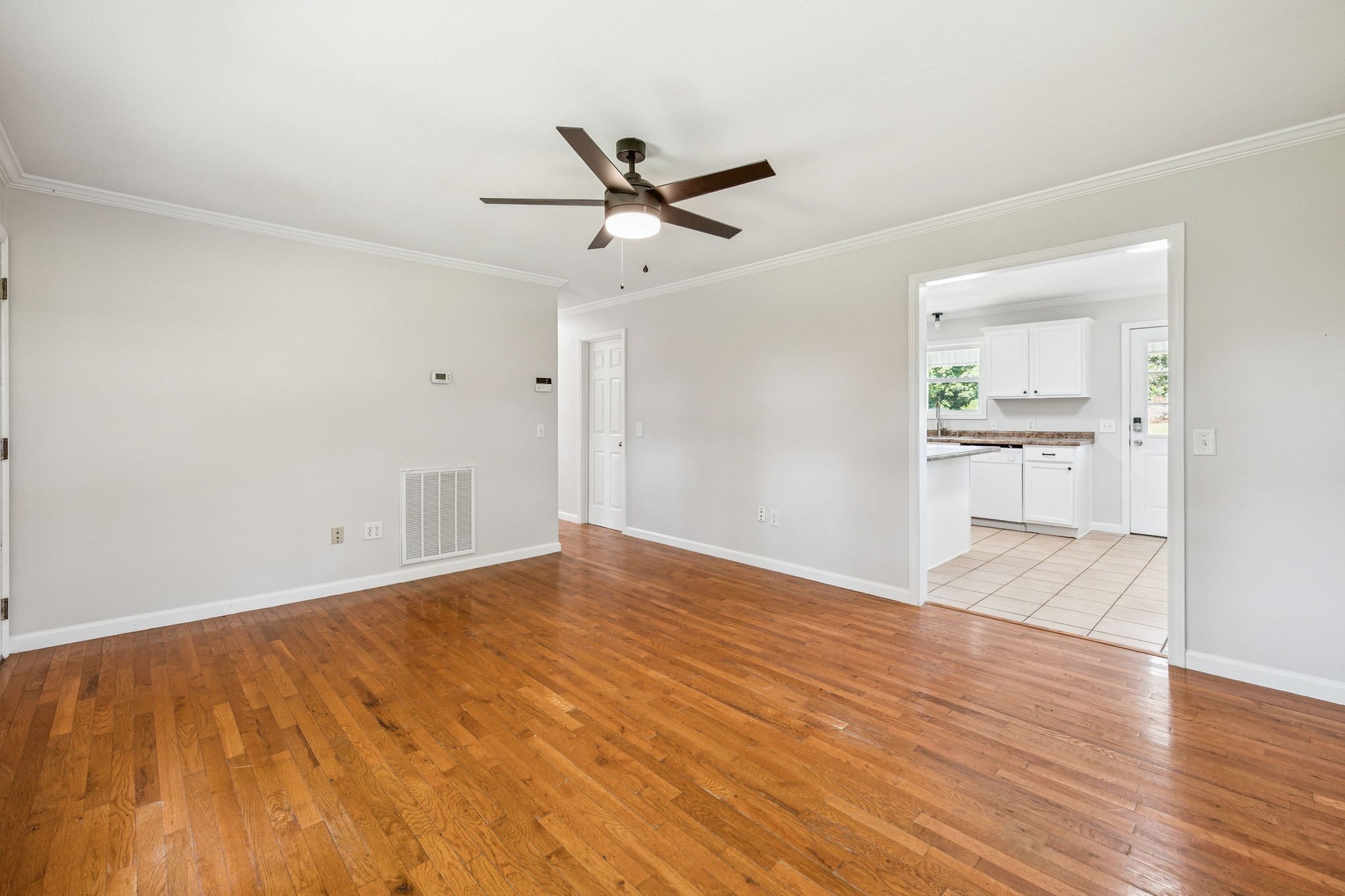 2585 Pow Road Baxter, TN 38544 - Photo 18 of 83 a view of empty room with wooden floor and window